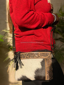 New Arrival Western Patterned Cowhide <b>Leather</b> New Stylish Handbag Carving Hand <b>Tooled</b> <b>Leather</b> Tassel Boho Hair on Hide Sling Bag - Product Image 4