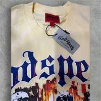 T-shirt organique de grande taille à col rond et à impression graphique de couleur unie en mousse 3D OEM d'été 100% coton acceptant la coutume