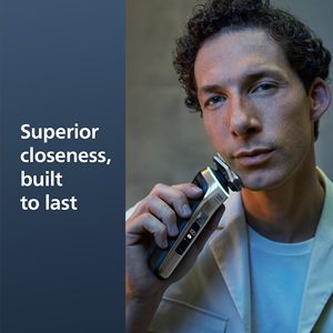 Afeitadora Eléctrica Húmeda/Seca con Sistema de Afeitado Rotatorio, Recortador de Triple Cuchilla Extraíble, Limpieza Automática, Base de Carga y Estuche de Viaje - Product Image 2