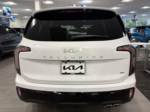 Clean White 2025 K i a Tell uride SX-Prestige X-Pro AWD con asientos de cuero Sistema de navegación Asientos de tercera fila Asientos calefactables - Product Image 3