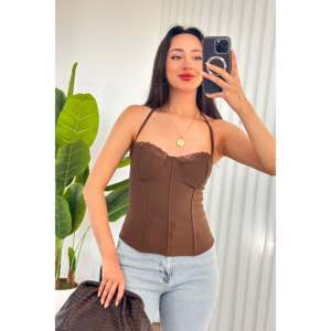 เสื้อชั้นในแบบไร้สายรัดคอ ทรงบัสติเยร์ สีดำ ขายส่ง - Product Image 1