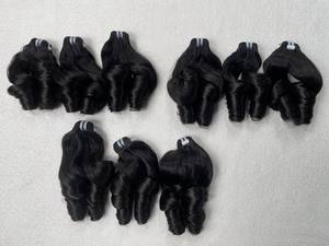Paquets de cheveux humains bouclés et rebondissants noirs naturels doublement étirés Extensions de cheveux humains en trame Extensions de cheveux humains vierges vietnamiens - Product Image 2