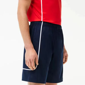 กางเกงเทนนิสผู้ชายแบบสั่งทำพิเศษ ผ้าเนื้อแน่น ระบายอากาศได้ดี แห้งเร็ว ผลิตจากโพลีเอสเตอร์/คอตตอน สไตล์สตรีท รับสกรีนโลโก้ คุณภาพสูง - Product Image 2