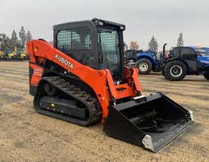 Chargeuse compacte sur chenilles Kubota SVL75-2 avec godet pour travaux agricoles et de construction - Product Image 1