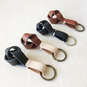 Porte-clés en cuir élégant pour femme avec gaufrage personnalisé idéal pour le charme du sac à main et l'utilisation quotidienne - Product Image 1