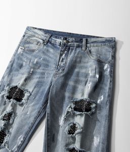 Am กางเกงยีนส์ไฮสตรีทปักลายตัวอักษรยี่ห้ออินเทรนด์กางเกงยีนส์สลิมยืดหยุ่นสำหรับผู้ชายกางเกงยีนส์ซักวินเทจสไตล์ฮิปฮอป - Product Image 5