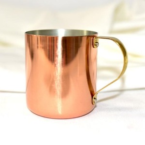 Artisanal copper Moscow mule <b>mug</b> with traditional curves and gleaming texture perfect for cold beverages and display - Product Image 3