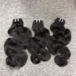 Venta al por mayor 100% Virgen vietnamita trama de pelo crudo de alta calidad onda del cuerpo Color claro gran Stock modelo de cinta - Product Image 2