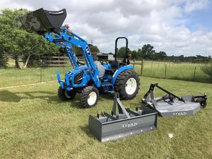 Minicargadora compacta LS 4x4 asequible con cargador frontal y excavadora trasera para uso en construcción agrícola - Product Image 6
