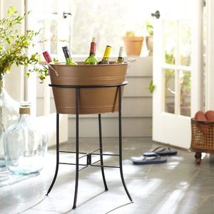Designer copper ice bucket with dual handles and hammered surface great for serving cold <b>drinks</b> at family or formal gatherings - Product Image 1