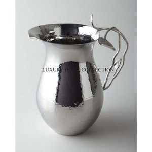 Intricately designed fancy water jug with premium finished and artistic details making it a great tabletop centerpiece - Product Image 1