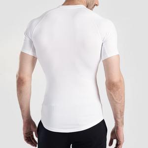 Camisa de compresión de Spandex/poliéster hecha en fábrica Manga corta Tamaño cómodo Logotipo impreso personalizado Calidad confiable Rash Guard - Product Image 4