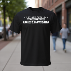Camiseta promocional de Another Day of Not Being Rich and Famous - Product Image 2