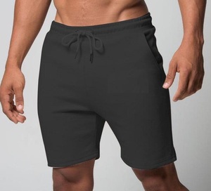 Pantalones cortos de poliéster 100% para hombre con cintura elástica Estilo deportivo teñido liso para actividades de gimnasio de yoga al aire libre - Product Image 4