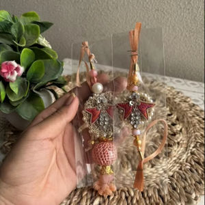 Elegant Classic Rakhi Set for Bhaiya and Bhabhi Raksha Bandhan Celebration Combo of Roli Chawal for Siblings - Product Image 1