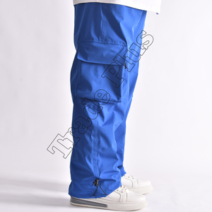 Pantalones de nieve holgados azules unisex, pantalones impermeables aislados con forro polar cálido, bolsillos de carga y parte inferior Cinch - Product Image 3