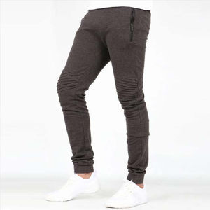 Pantalón de Hombre de Material Resistente al Viento con Superficie Suave al Tacto que Proporciona una Apariencia Elegante, Sensación Cómoda y Corte Recto - Product Image 1