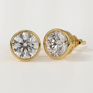 Bezel <b>Set</b> Moissanite <b>Stud</b> <b>Earrings</b> in Yellow Gold Modern Design Jewelry with Sleek Edges Ideal for Party or Daily Use - Product Image 1