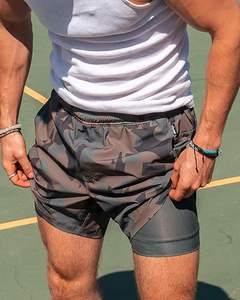 กางเกงขาสั้นออกกำลังกายผู้ชายเทรนด์ใหม่ประจำฤดูร้อนปี 2024 ระบายอากาศได้ดี ผ้าสองชั้น แห้งเร็ว เหมาะสำหรับวิ่งกลางแจ้ง ลายเรียบ - Product Image 2