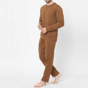 Conjunto de chándal de algodón personalizado para hombre de alta calidad al por mayor de chándal de fitness liso con logotipo en tela de lana - Product Image 2