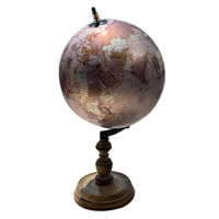 Globe décoratif inspiré du voyage en métal durable avec base antique élégante, parfait pour les explorateurs et les collectionneurs de cartes