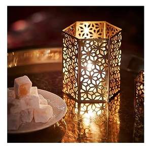 Portavelas de metal dorado con forma cilíndrica creativa - Product Image 3