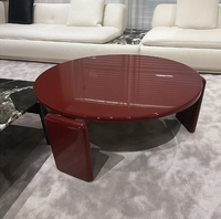 Table basse moderne Duomo - Pierre laquée brillante |   Design rond contemporain fait main avec pieds sculpturaux pour salon