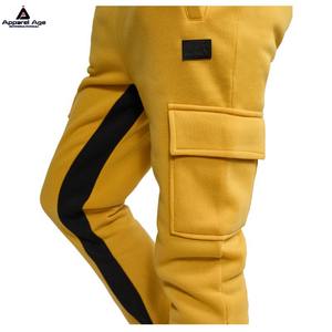 กางเกงกีฬาผ้าฝ้ายลำลองผู้ชายฤดูใบไม้ร่วงสีพื้นน้ำหนักเบามีกระเป๋ารูดแบบเรียงซ้อนออกแบบโลโก้ได้ตามต้องการ - Product Image 3