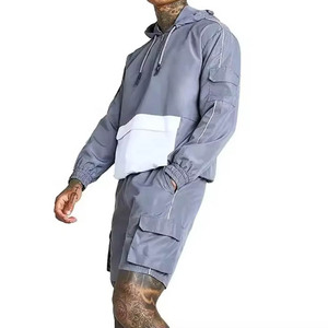ชุดเสื้อแจ็คเก็ตกันลมและกางเกงขายาวผู้ชาย น้ำหนักเบา ยืดหยุ่น ผลิตจากโพลีเอสเตอร์ 100% เหมาะสำหรับออกกำลังกายกลางแจ้ง วิ่ง เดินทาง และใช้ในชีวิตประจำวัน - Product Image 3