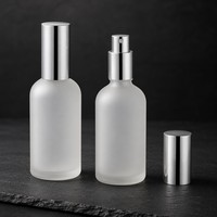 Flacon pulvérisateur de parfum cylindrique en verre blanc dépoli mat avec pompe, sérigraphie, 30/50/100 ml, vente en gros, MOQ personnalisé