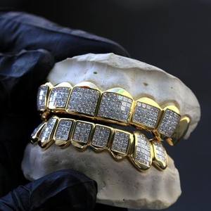 กริลส์14K ฟันทองเพชรโมอิสชุบทองวินเทจของขวัญงานปาร์ตี้สำหรับผู้ชายและผู้หญิง2024สั่งทำ - Product Image 1