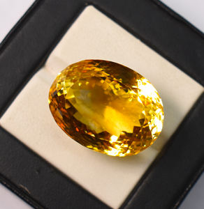 Citrine naturelle dorée ovale facettée couleur or 24X19X16 mm 52,94 carats - Product Image 3