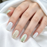 A040 Faux ongles à presser vert menthe effet œil de chat glacé, 30 pièces, feuille d'or gaufrée, ultra courts forme cercueil, vente en gros