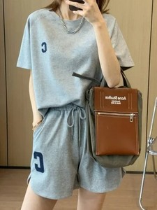 Conjunto de 2 piezas de algodón 100% al por mayor para mujer, pantalones cortos con diseño de logotipo personalizado, camisa, conjuntos de manga corta de calidad Premium para mujer - Product Image 2