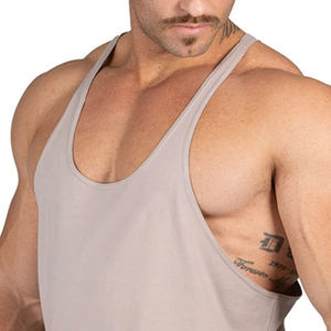 Camiseta sin mangas para hombre hecha de material de algodón y poliéster para actividades informales y deportivas, ideal para sesiones de entrenamiento de verano - Product Image 1