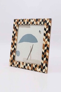 Premium vintage horn frame for photographs with organic patterns crafted by skilled artisans for <b>aesthetic</b> classic interiors - Product Image 6