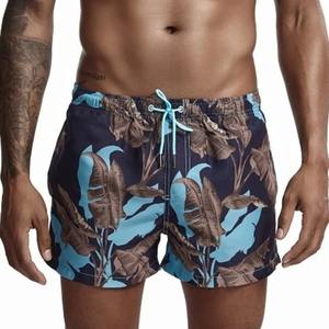 Pantalones cortos de estilo Hip Hop para hombre 2025, ropa deportiva sólida de secado rápido, bañadores de playa, forro de malla, Traje de surf, característica corta antiarrugas - Product Image 1