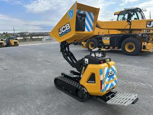 รถดัมพ์ตีนตะขาบไฟฟ้า JCB HTD-5E ขนาดเล็ก บรรทุกหน้าได้ 500 กก. กำลังไฟ 9 กิโลวัตต์ แบตเตอรี่ลิเธียม 48 โวลต์ ความจุถัง 0.43 ลูกบาศก์เมตร ยกเทได้สูง - Product Image 1