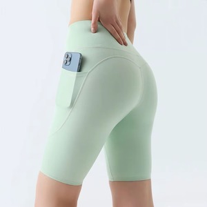 Pantalon de yoga taille haute pour femmes Short de sport en spandex solide avec poche latérale Short de yoga personnalisé de grande taille de haute qualité - Product Image 3