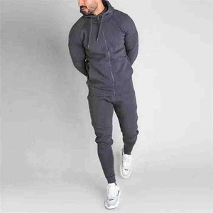 Conjunto de dos piezas con pantalones elásticos para hombre, conjunto de dos piezas con patrón sólido para correr en el gimnasio, venta al por mayor - Product Image 2