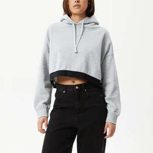 Sweat à capuche pour femmes à la mode tricoté extérieur haut court avec impression personnalisée hiver col à capuche en gros - Product Image 1