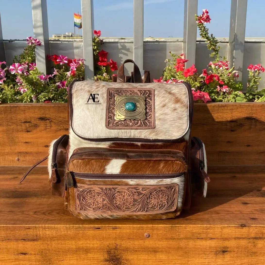 Designer Boho Handcrafted Western Tooled & Cowhide Leather Diaper Bags Stylish Brown Concho Bags Wholesale Backpack For Unisex