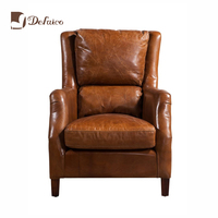 Fauteuil lounge en cuir pleine fleur vintage artisanal Defaico, fauteuil en cuir véritable brésilien
