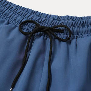 ชุดออกกำลังกายฤดูร้อนแบบ 2 ชิ้น ดีไซน์ใหม่ คุณภาพสูง ระบายอากาศได้ดี กางเกงจ็อกเกอร์พร้อมโลโก้สั่งทำพิเศษ ชุดกางเกงขาสั้นวิ่งสำหรับผู้ชาย - Product Image 5