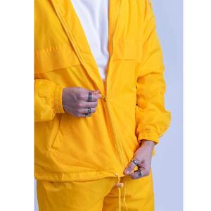 Survêtement en nylon coupe-vent OEM pour hommes logo imprimé DTF personnalisé Survêtement imperméable de sport léger pour la course à pied Streetwear - Product Image 2