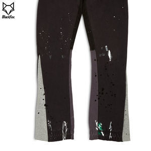 กางเกงวอร์มผ้าฟลีซทรงบานสำหรับผู้ชายเอวยางยืดพิมพ์ลายสกรีนผ้าไหมแบบลำลองพร้อมการตกแต่งทาสี - Product Image 3