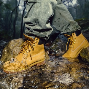Bottes de randonnée jaunes en cuir véritable imperméables et antidérapantes pour hommes et femmes, bottes de sécurité de luxe de créateur pour toutes les saisons - Product Image 3