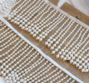 Cinta de satén con borlas rosas, adornada con perlas y cuentas. - Product Image 1