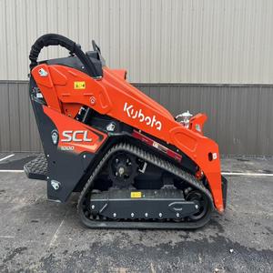 ORIGINAL KUBOTA SCL1000 <b>STAND</b>-ON COMPACT MINI SKID STEER LOADER WITH ATTACHMENTS FOR SALE - Product Image 1