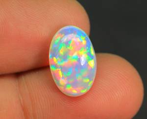 Merveilleuse pierre précieuse opale éthiopienne lisse polie forme ovale Welo brillant Multi Flashy cabochon opale éthiopienne pour la fabrication de bijoux - Product Image 4